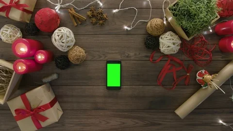 Top View Using Smartphone Christmas Gifts Stock Footage 81454395