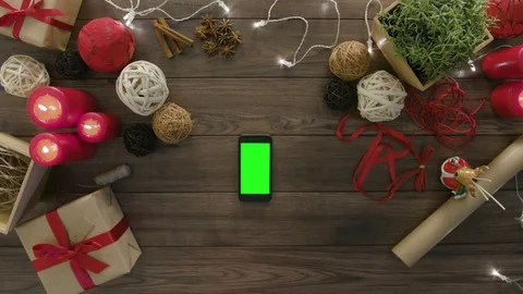 Top View Using Smartphone Christmas Gifts Stock Footage 81455419