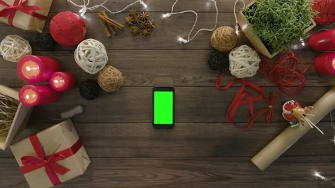 Top View Using Smartphone Christmas Gifts Stock Footage 81456208