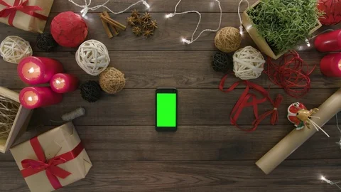 Top View Using Smartphone Christmas Gifts Stock Footage 81456320