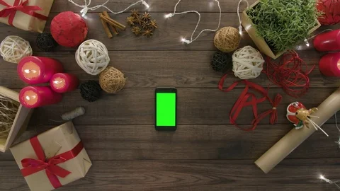 Top View Using Smartphone Christmas Gifts Stock Footage 81457039