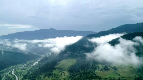 Top view valley with clouds and thick mist, aerial view  Stock Footage 322061721