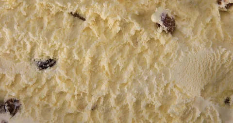 Top view of vanilla flavour ice cream with raisins in box Stock Footage 113635432