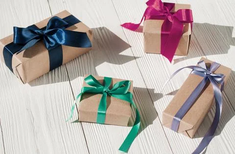 Top view of various gift boxes on wooden table. Christmas gift boxes on woode Stock Photos