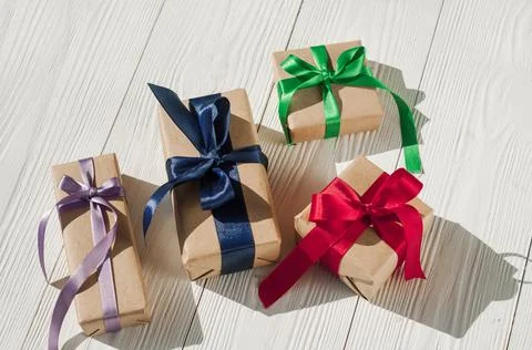 Top view of various gift boxes on wooden table. Christmas gift boxes on woode Stock Photos