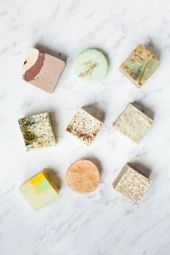 Top view of various handcrafted soap and solid shampoo top view of various... 스톡 사진