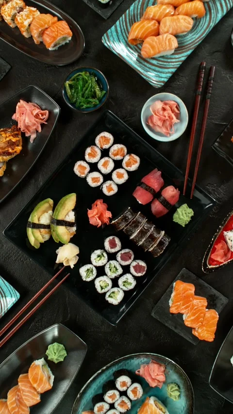 Top View of Various Kind of Sushi Pieces with Camera Motion. Stock Footage 308371248