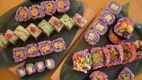 Top view of various sets of colorful vegan sushi rolls with tofu and vegetables 스톡 사진