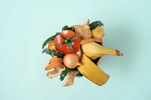 Top view vegetable peeling on blue background, composting Stock Photos