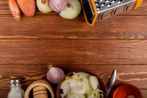 Top view of vegetables as different types of whole cut and sliced onions pota Stock Photos