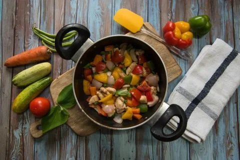 Top view of vegetables saute in a pan Stock Photos
