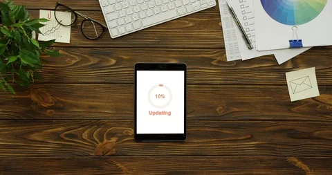 Top view on the vertical black tablet computer with white screen on which circle Stock Footage 95097890