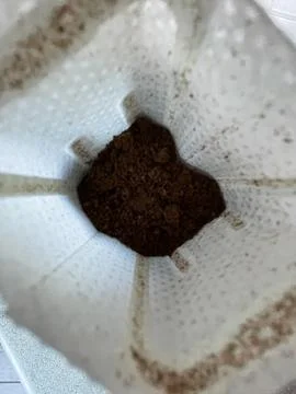 Top view vertical close up of gound coffee in a drip filter bag Stock Photos