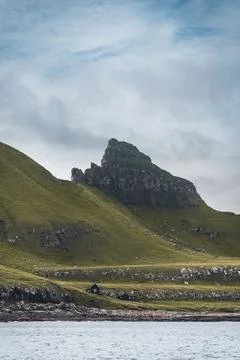 Top view vertical composition with the iconic Drangarnir gate, Tindholmur and Stock Photos