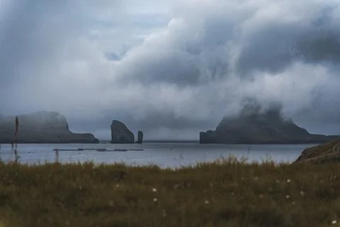 Top view vertical composition with the iconic Drangarnir gate, Tindholmur and Stock Photos