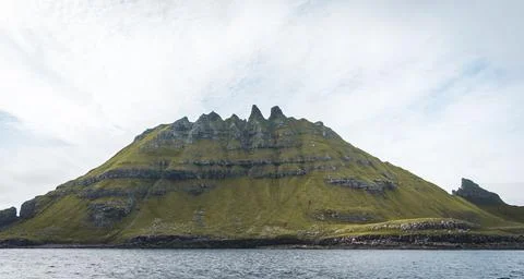 Top view vertical composition with the iconic Drangarnir gate, Tindholmur and Stock Photos