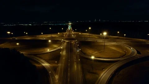 Top view of the viaduct road junction along which cars travel at night Stock Footage 157998212