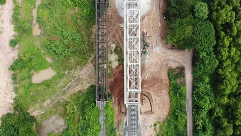 Top view video 4K, High angle video slides through river bridge. Stock Footage 95991292