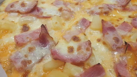 Top view video Hot pizza rotates on the paper tray. Stock Footage 100548368