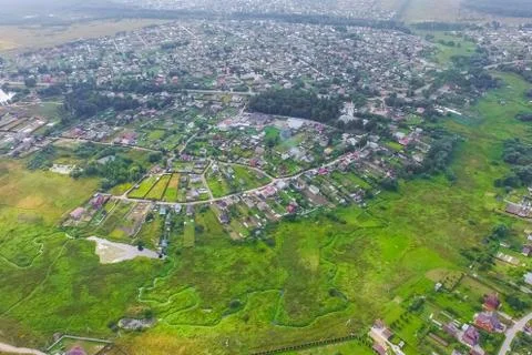 Top view of the village, fields and forests near the village. Stock Photos