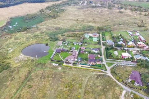 Top view of the village, fields and forests near the village. Stock-Fotos