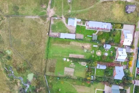 Top view of the village, fields and forests near the village. Stock Photos