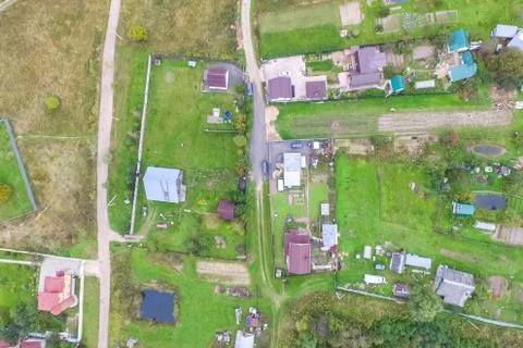 Top view of the village, fields and forests near the village. Stock Photos