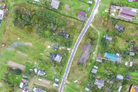 Top view of the village, fields and forests near the village. Stock Photos