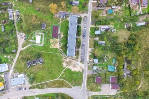 Top view of the village, fields and forests near the village. Stock Photos