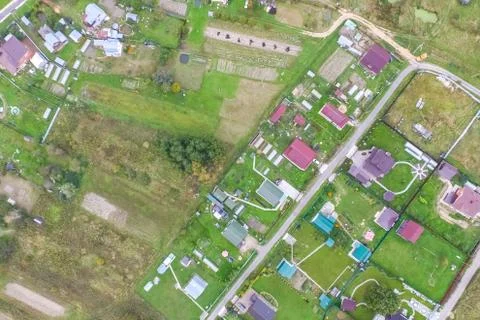 Top view of the village, fields and forests near the village. Stock Photos