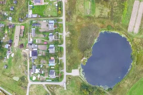 Top view of the village, fields and forests near the village. Stock Photos