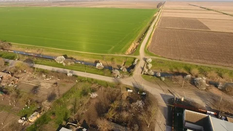Top view of the village. One can see the roofs of the houses and gardens. Road Stock Footage 95927611