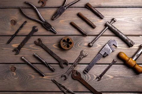 Top view of vintage technical instruments on wooden background Stock Photos
