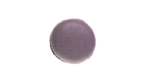 Top view of violet macaroon cookie rotating. Isolated on white background. Stock-Footage 161055600