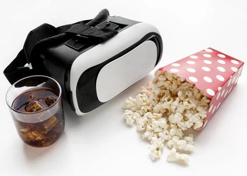 Top view virtual reality headset and popcorn Stock Photos