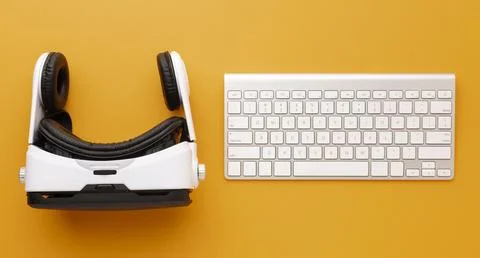 Top view virtual reality headset and keyboard Stock Photos