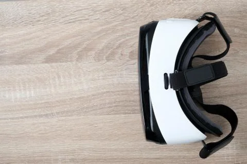 Top view VR virtual reality glasses  on wooden table Stock Photos
