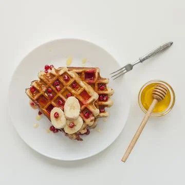 Top view waffle with honey fork Stock Photos