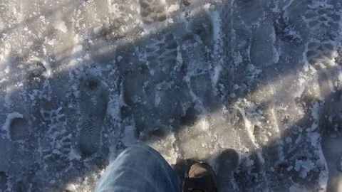 Top View Walking On Melting Snow Stock Footage 73897940