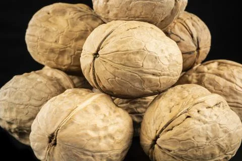 Top view walnut in shell isolated on black background Stock-Fotos