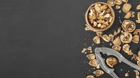 Top view walnuts with cracker copy space. High quality and resolution beautiful Stock Photos