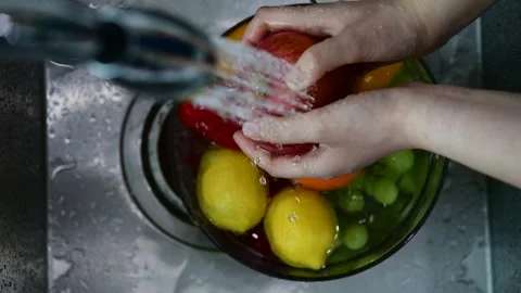 Top View of Washing Fresh Fruit in Kitchen Sink Stock Footage 335798321