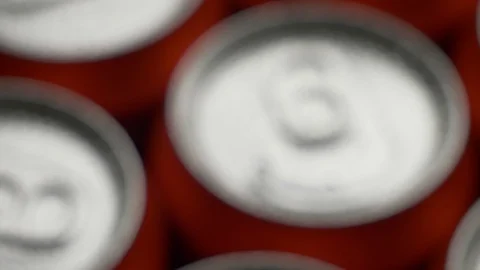 Top view water droplets on red can of soda or beer rotate background Stock Footage 106737858