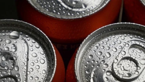 Top view water droplets on red can of soda or beer rotate background Stock Footage 106737902