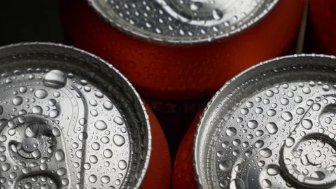 Top view water droplets on red can of soda or beer pan panorama rightward tripod Stock Footage 106738015
