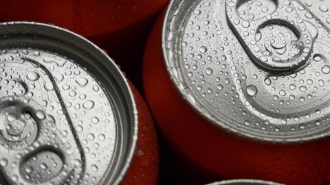 Top view water droplets on red can of soda or beer rotate background Stock Footage 106738199