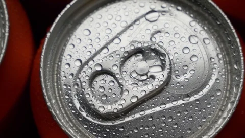 Top view water droplets on red can of soda or beer rotate background Stock Footage 106738308