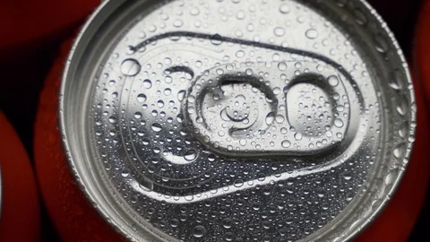 Top view water droplets on red can of soda or beer rotate background Stock Footage 106738367