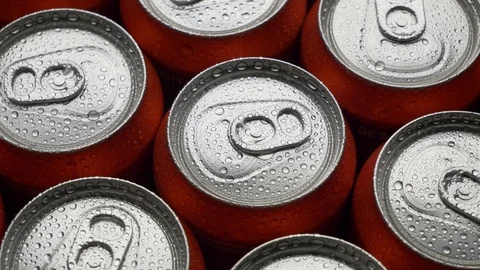 Top view water droplets on red can of soda or beer rotate background Stock Footage 106738585