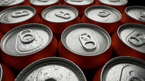 Top view water droplets on red can of soda or beer rotate background Stock Footage 106738770